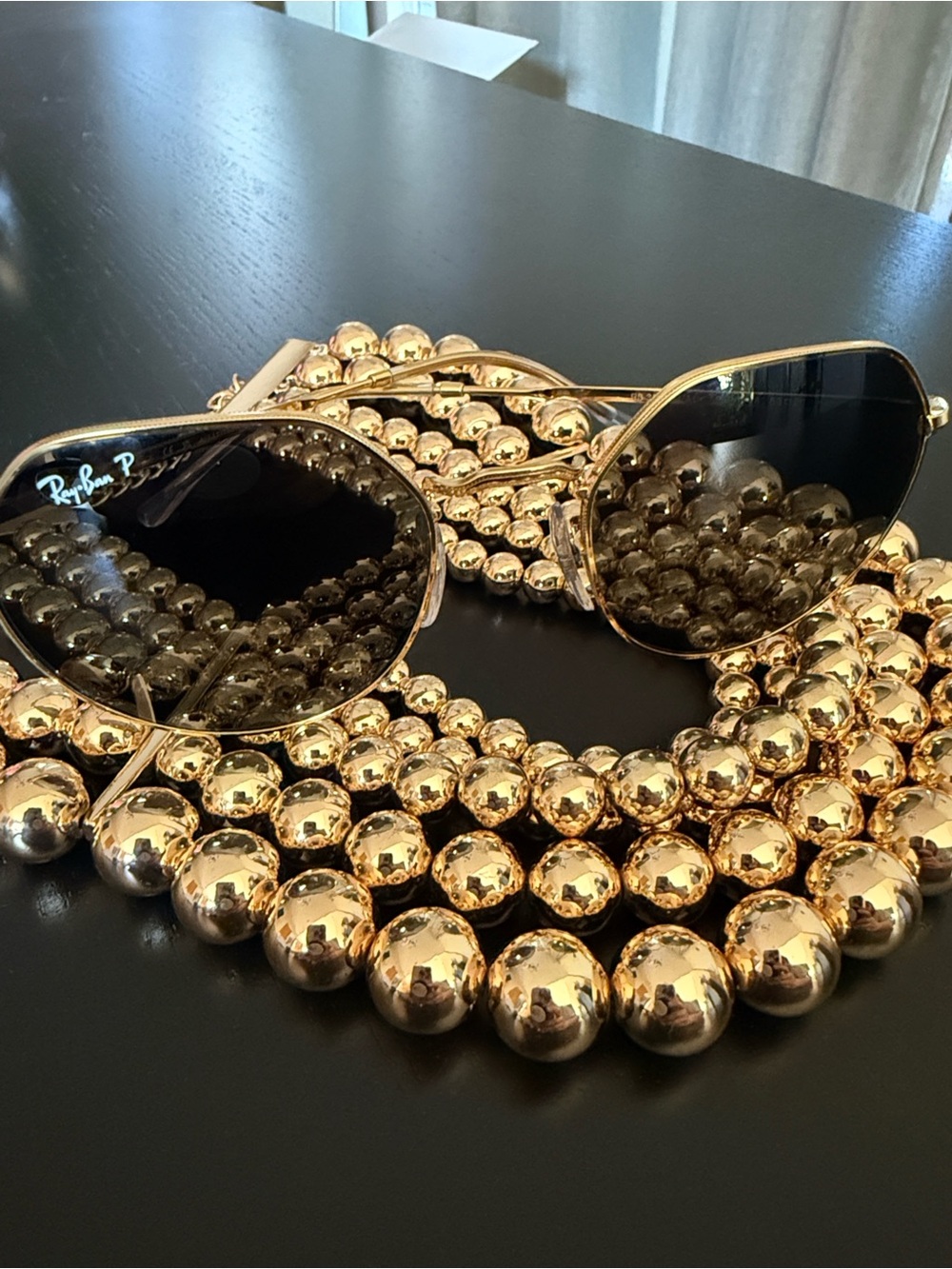 Ray-Ban Gold Frame Sunglasses with Black Lenses